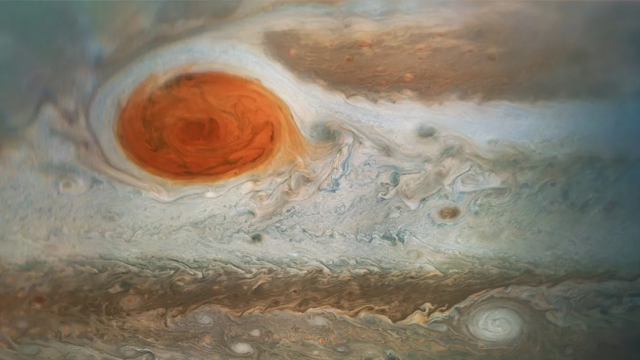 Jupiter’s Great Red Spot, seen in this color-enhanced image from NASA’s Juno spacecraft, is a morass of clouds wider than Earth that has been swirling for hundreds of years.